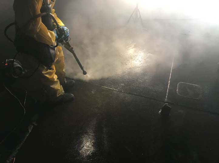 spraying to clean up