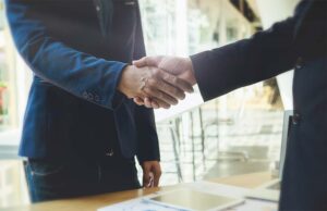 partnership shaking hands