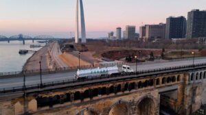 Illini Environmental tanker truck on a bridge